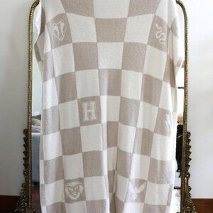 Cream and white Hogwarts checkered blanket